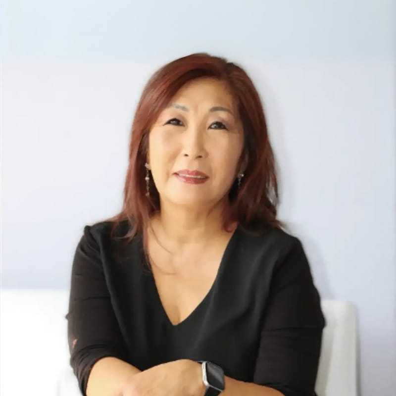 Portrait of Susan Yi, a professional stylist at K Style Salon & Bodyworks, showcasing their expertise and style.