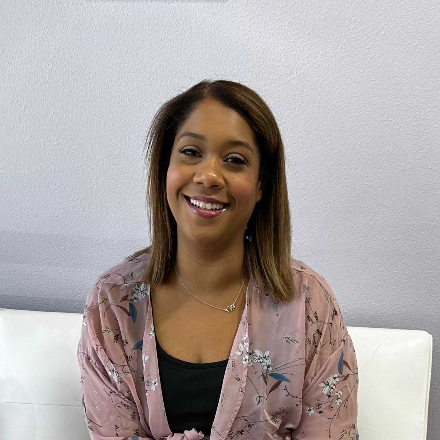 Portrait of Meridian Lozano, a professional stylist at K Style Salon & Bodyworks, showcasing their expertise and style.
